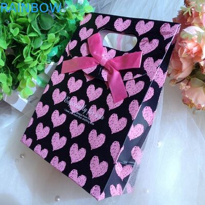 크리스마스를 위한 손잡이를 가진 개인화된 주문을 받아서 만들어진 종이 봉지