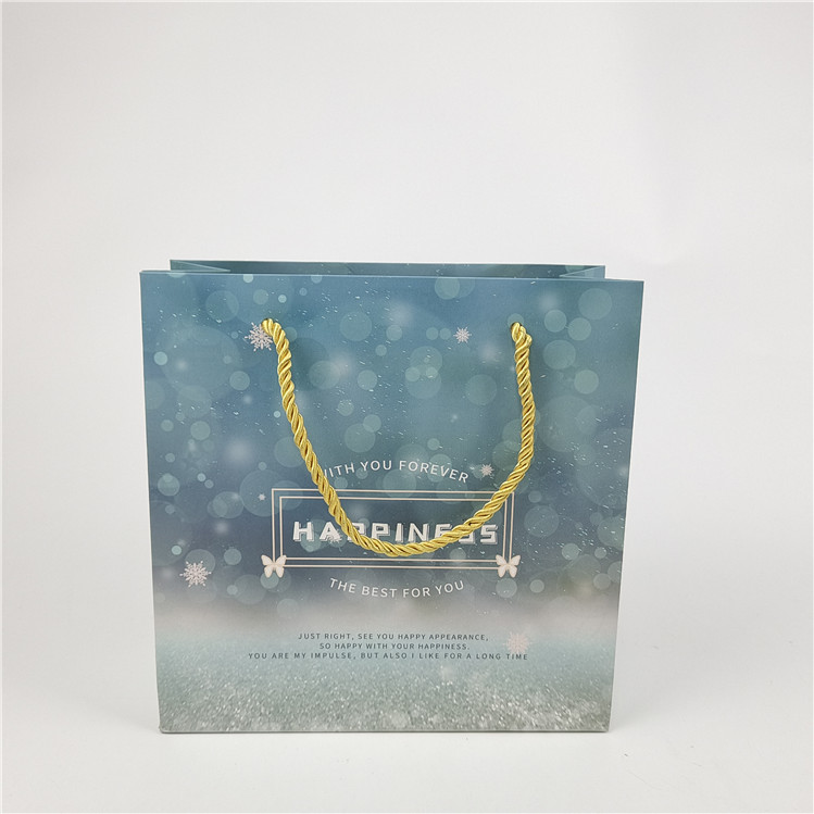 가장 많이 팔리는 재활용 가능한 환경 친화적 로고 인쇄 된 쇼핑용 종이 가방 포장 흰색 110 그램 재사용