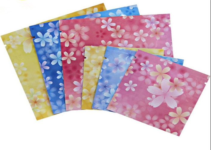 가면을 위해 포장하는 주문을 받아서 만들어진 3개의 측에 의하여 밀봉되는 분홍색 색깔 화장용 부대